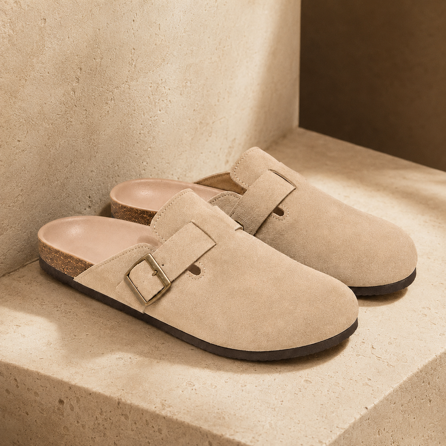 Beige Marlow suede buckle clogs shown as a pair on a warm white background.