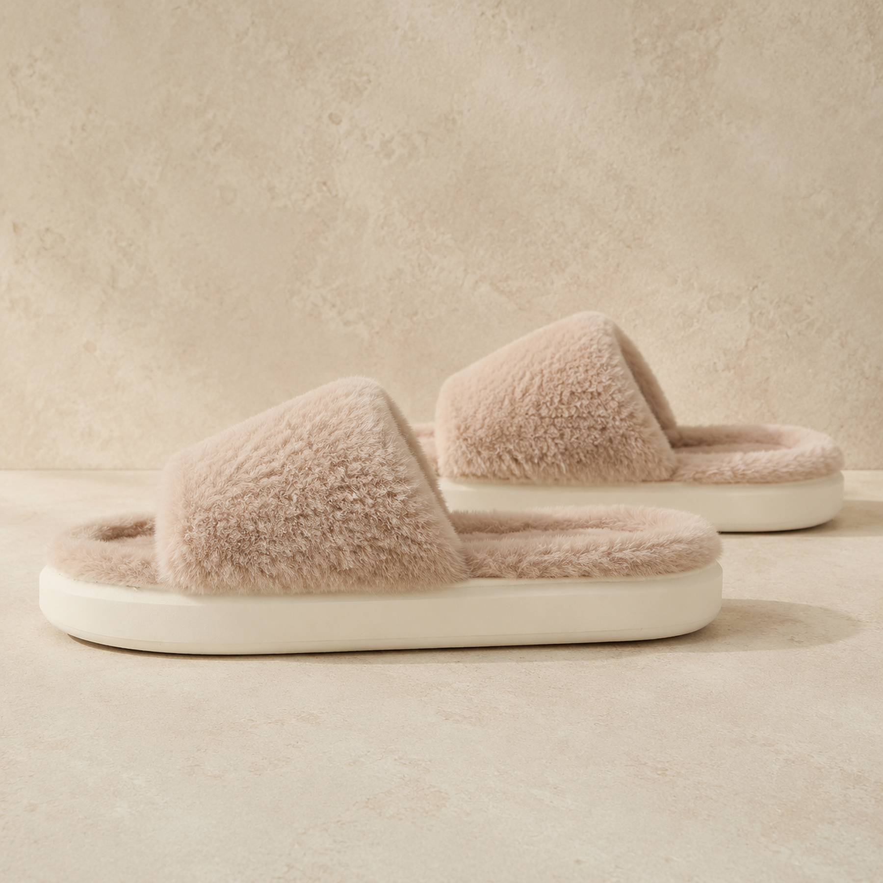 Side profile of Khaki Veloura slides showing the fluffy upper, open heel and flat outsole.