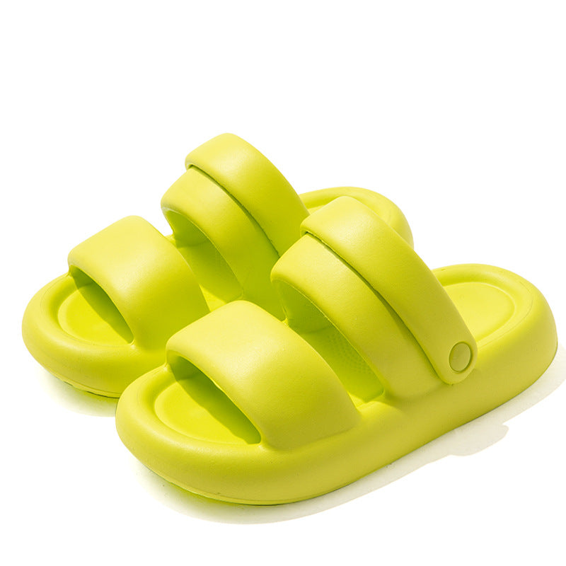 Cove sandals in Citrus Green, shown as a pair with two broad straps and rounded soles.